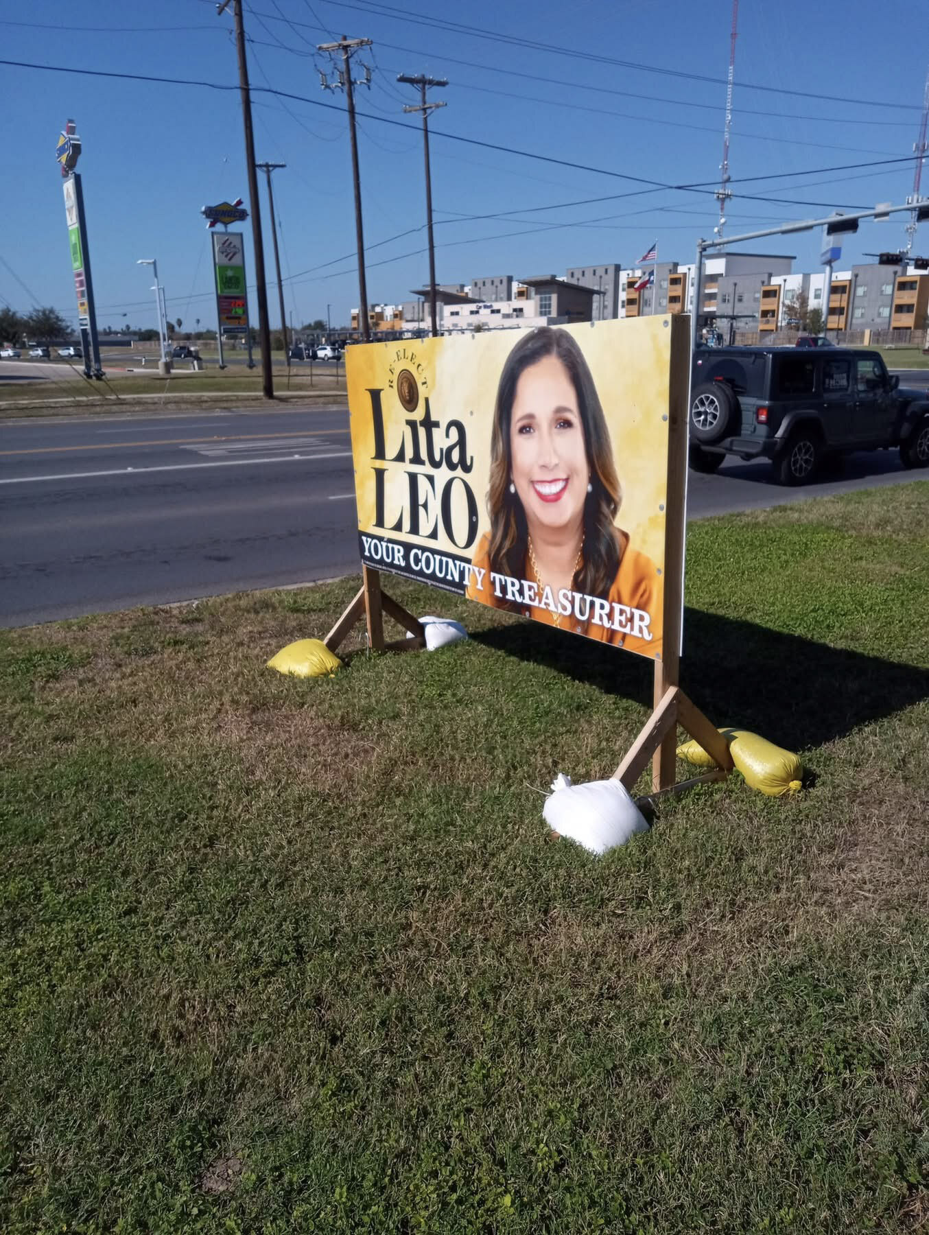 Lita Leo roadside campaign signage from 2026